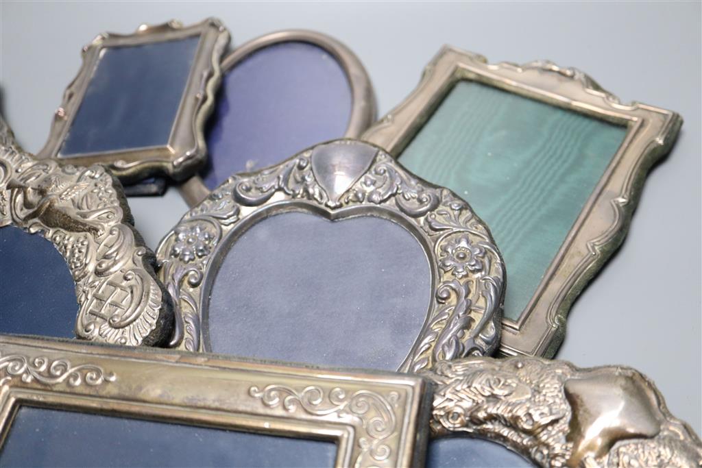 Nine assorted modern silver mounted photograph frames, largest 24.3cm.